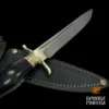 Традиционная финка НКВД «Волк» с авторским литьём. Кованая сталь Х12МФ (61 HRC), сатиновая полировка клинка, рукоять из граба, гарда с изображением волка. Эксклюзивная модель с документами